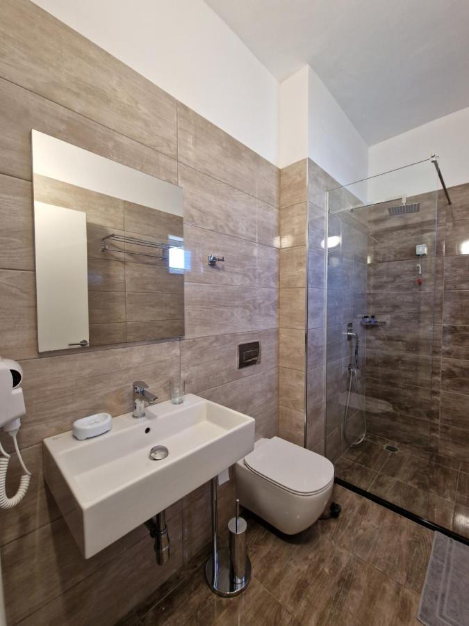 Hotel Queen Margaret Seaside Ксамил Экстерьер фото
